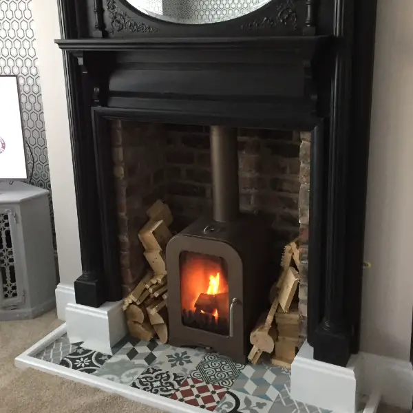Brick Fireplace With Log Burner With Tiled Herth