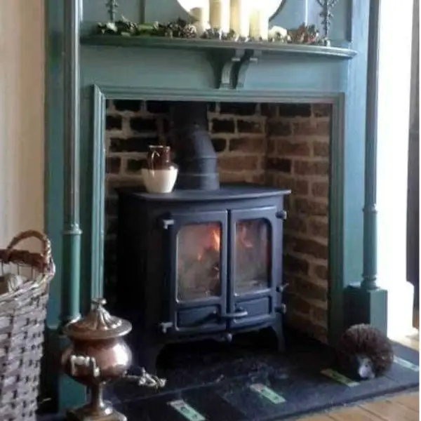 Brick Fireplace With Log Burner With Feature Mantel